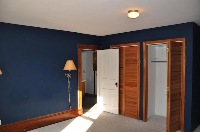 unfurnished bedroom featuring carpet flooring