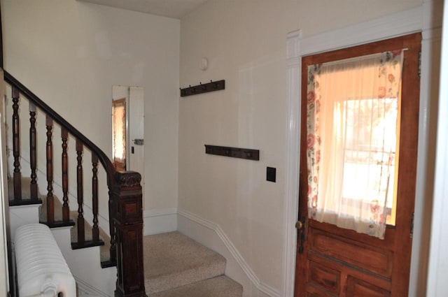 foyer entrance featuring radiator