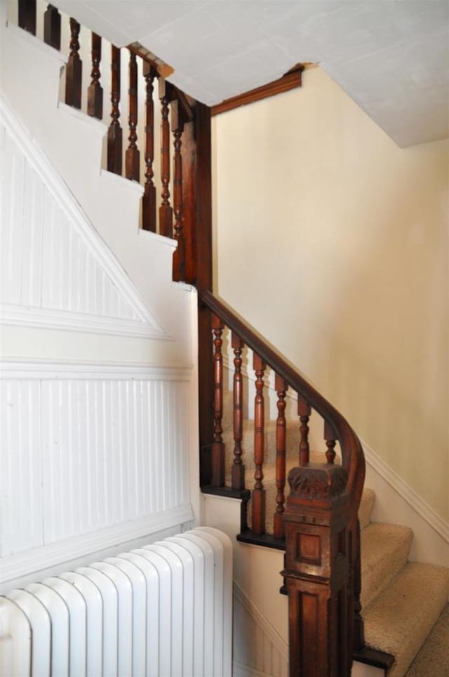 staircase with radiator heating unit