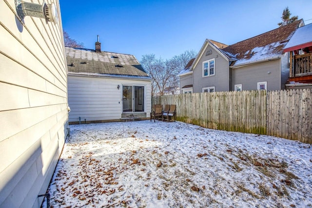 view of snow covered house