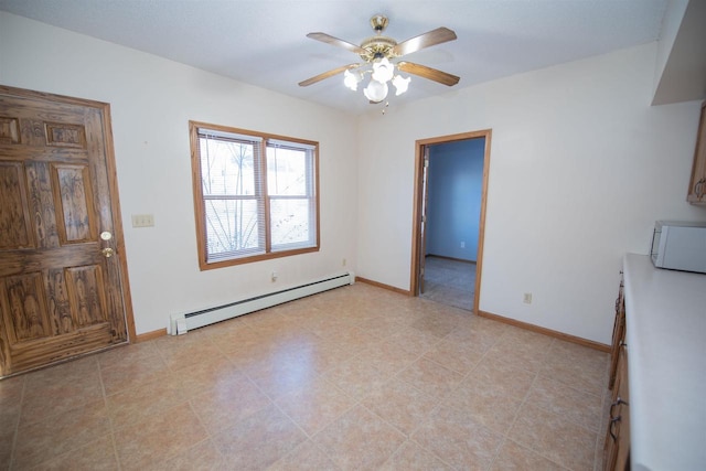 unfurnished living room with ceiling fan and a baseboard radiator