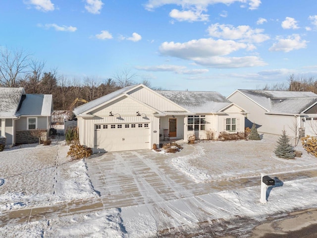 single story home with a garage