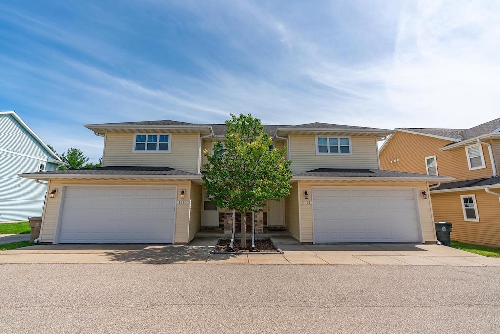 view of front of property featuring a garage