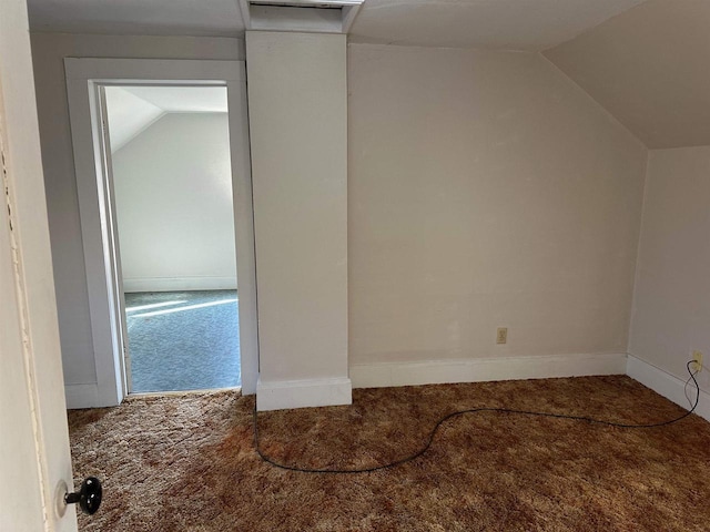 bonus room featuring carpet and lofted ceiling