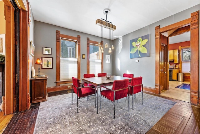 dining area featuring dark hardwood / wood-style flooring