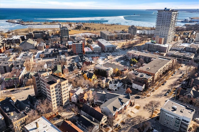 birds eye view of property featuring a water view