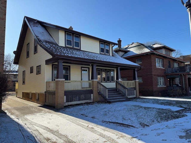 view of front of home featuring covered porch