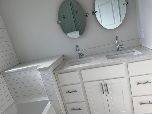 bathroom featuring vanity and bathing tub / shower combination