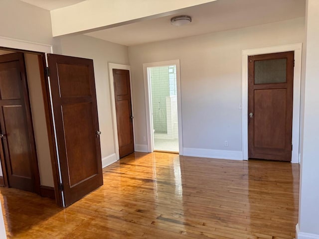 unfurnished bedroom with light hardwood / wood-style flooring