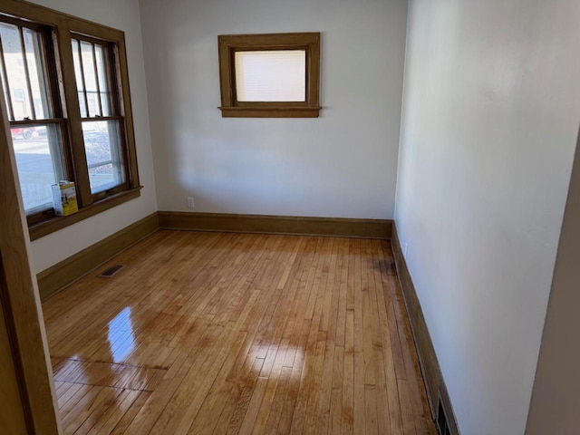 empty room with light wood-type flooring