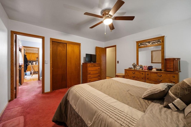 bedroom featuring ceiling fan, a closet, and carpet floors