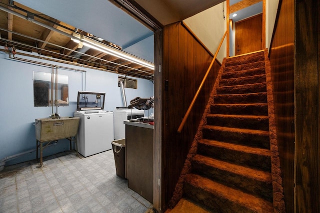 laundry room with washing machine and dryer and sink