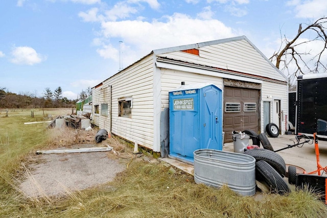 exterior space with a garage