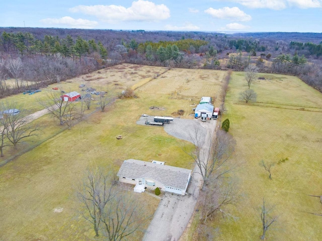 birds eye view of property with a rural view