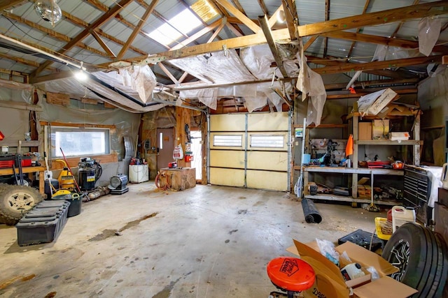 garage featuring a workshop area