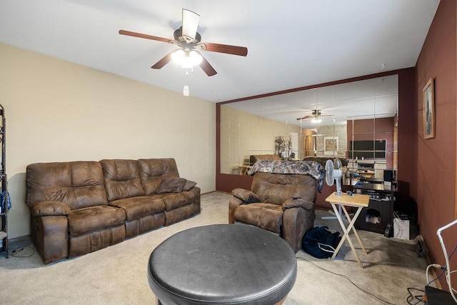 living room with carpet and ceiling fan