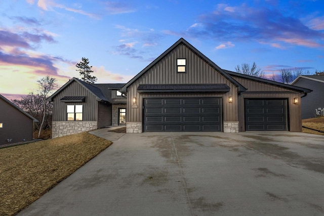 modern farmhouse style home featuring a garage