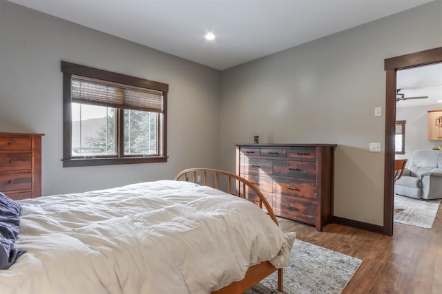 bedroom featuring dark hardwood / wood-style floors