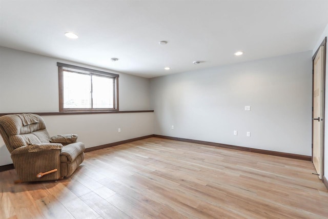 unfurnished room featuring light hardwood / wood-style flooring