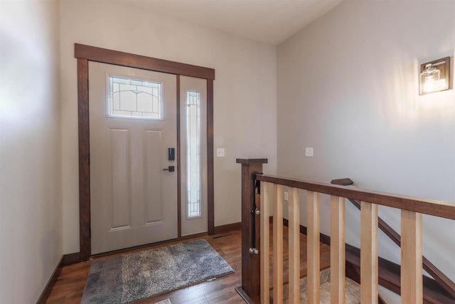 foyer entrance with dark hardwood / wood-style flooring