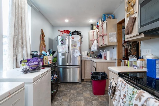 500 E 5th St, Merrill, WI 54452 - kitchen with light brown cabinets and stainless steel appliances