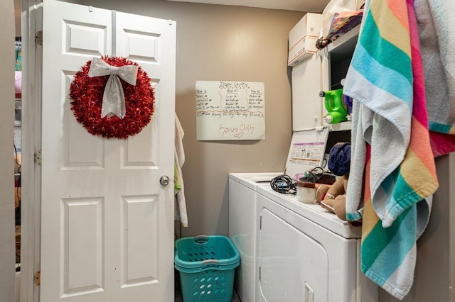 500 E 5th St, Merrill, WI 54452 - laundry room featuring a wall unit AC and washing machine and clothes dryer