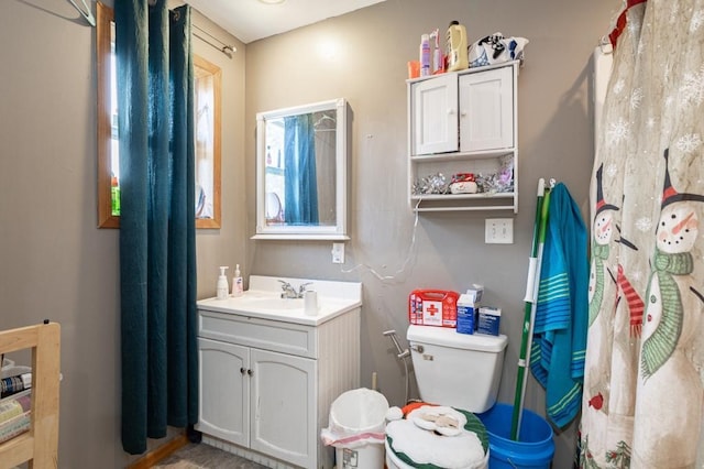 500 E 5th St, Merrill, WI 54452 - bathroom featuring vanity and toilet