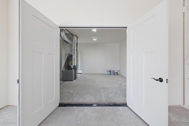 interior space featuring concrete flooring