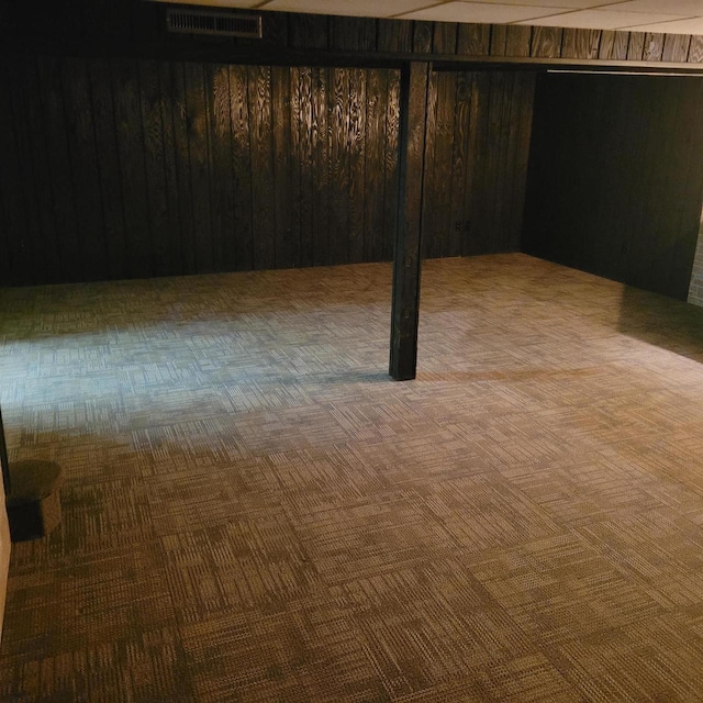 basement with wood walls