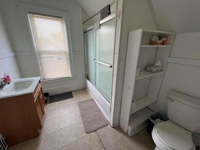 full bathroom with toilet, vanity, vaulted ceiling, and shower / bath combination with glass door