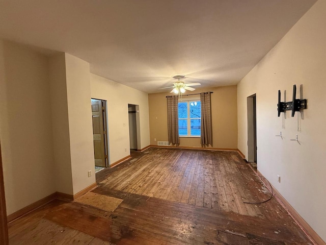 unfurnished room with hardwood / wood-style flooring and ceiling fan