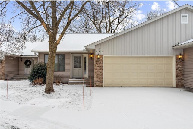 view of front of home with a garage