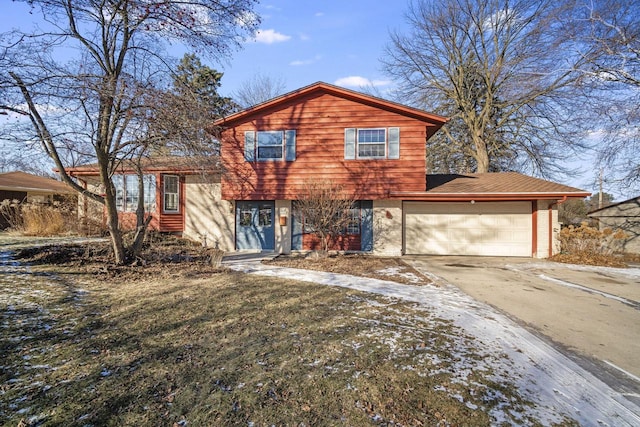 view of front of home with a garage