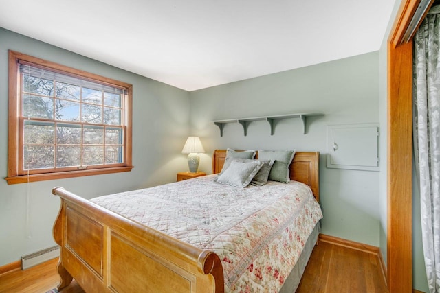 bedroom featuring light wood-type flooring