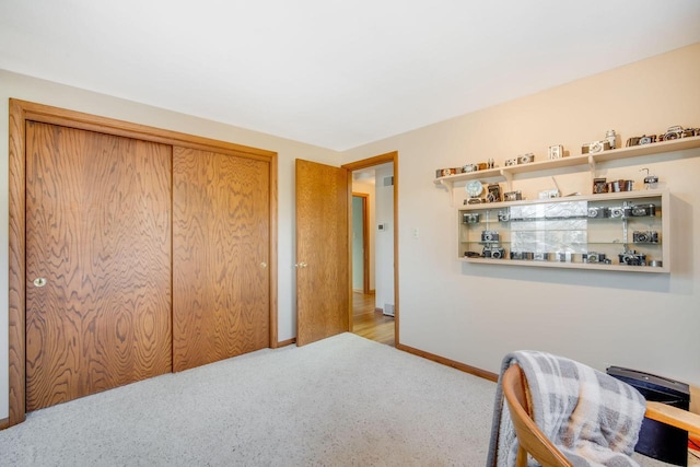 carpeted bedroom with a closet