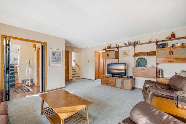 living room with light colored carpet