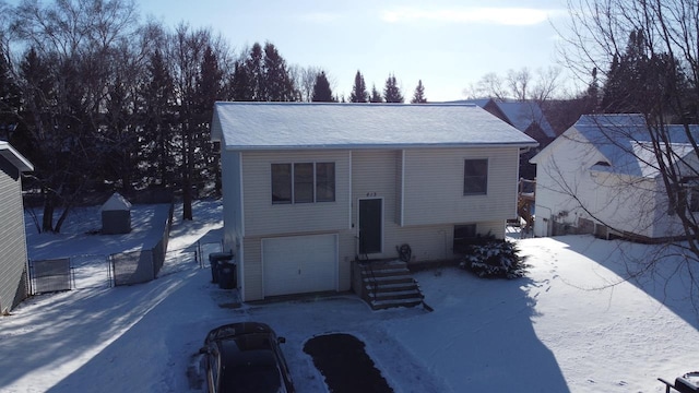 raised ranch with a garage