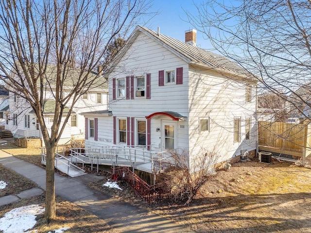 view of front of property with cooling unit