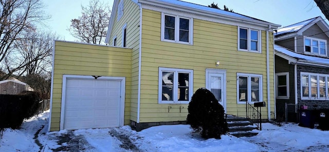 view of front of house with a garage