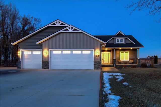 craftsman inspired home with a garage