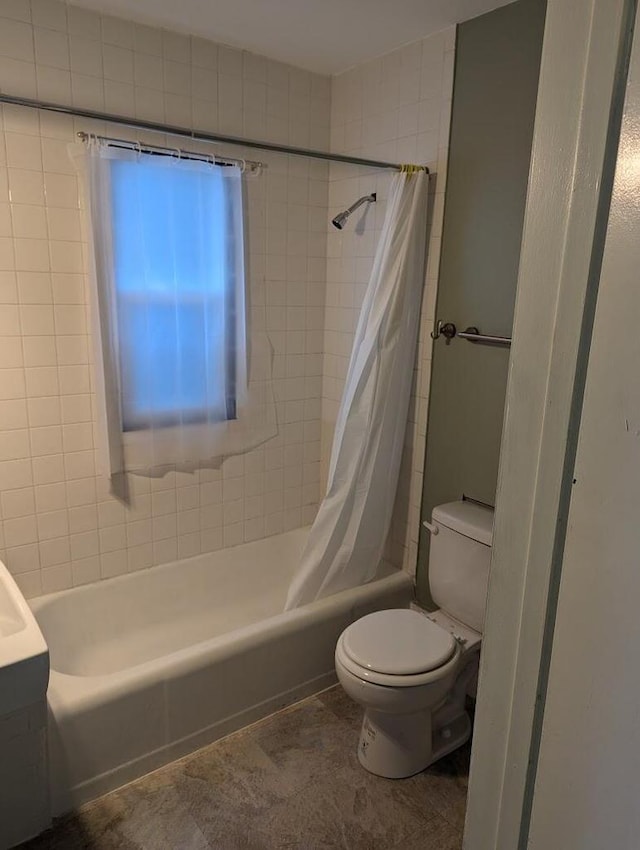 full bathroom featuring vanity, toilet, and shower / bath combo with shower curtain