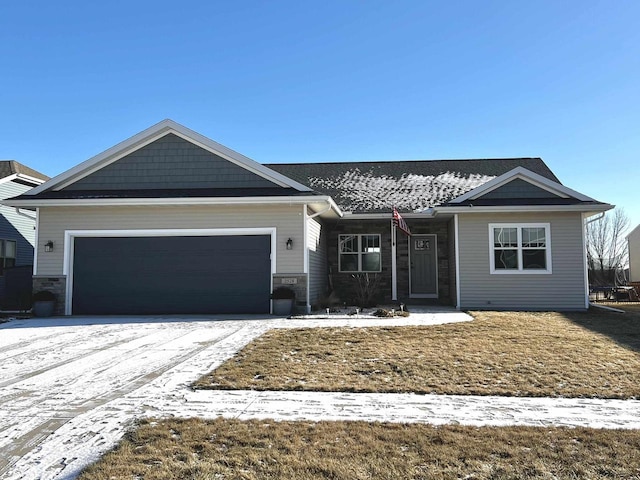 ranch-style house featuring a garage