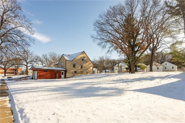 view of yard covered in snow