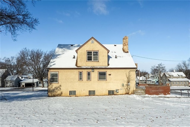 view of snow covered property