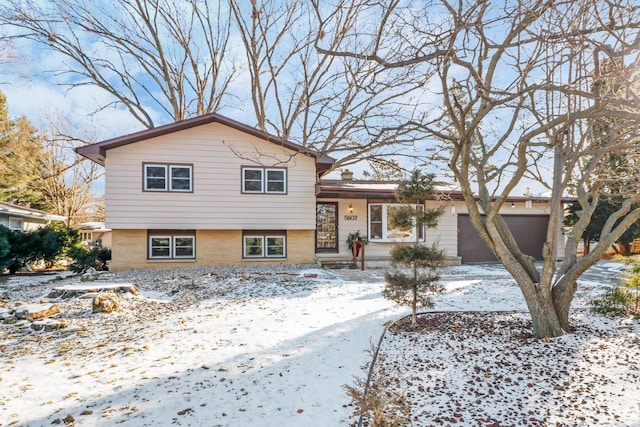 tri-level home featuring a garage