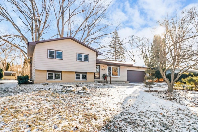 split level home with a garage