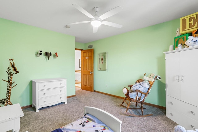 carpeted bedroom featuring ceiling fan