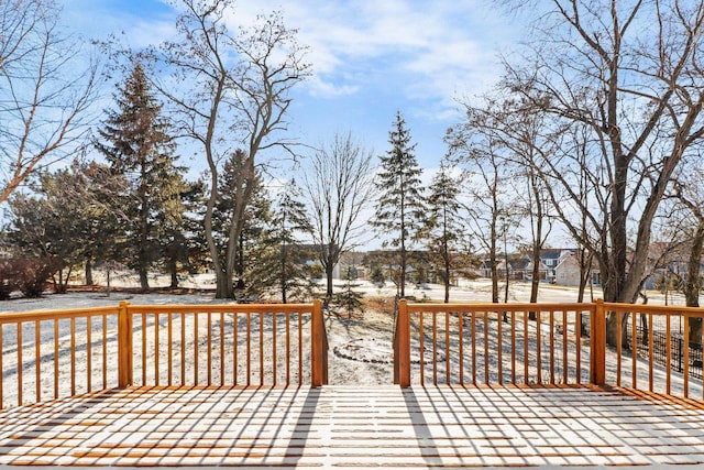 view of snow covered deck