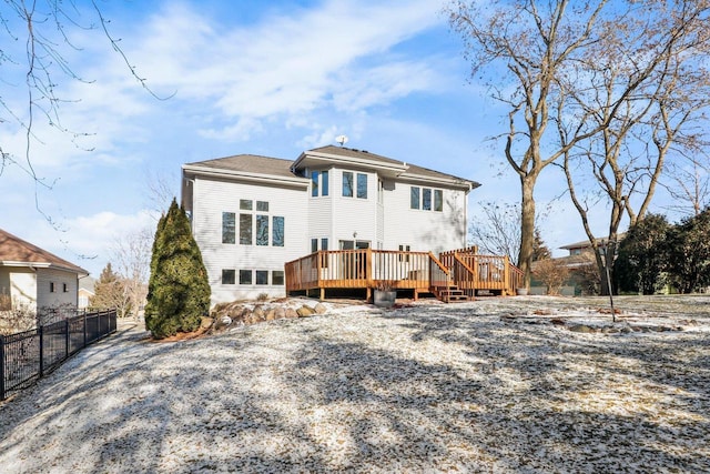 rear view of house with a deck