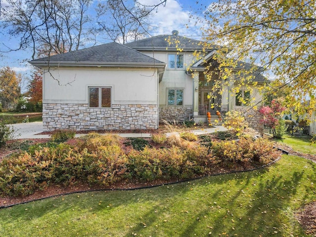 view of property exterior featuring a lawn